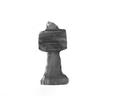  <em>Djed-pillar Amulet</em>. Carnelian, 37.1144E: 15/16 x 3/8 x 3/16 in. (2.4 x 1 x 0.4 cm). Brooklyn Museum, Charles Edwin Wilbour Fund, 37.1144E. Creative Commons-BY (Photo: Brooklyn Museum, CUR.37.1144E_NegID_37.1138E_GRPA_cropped_bw.jpg)