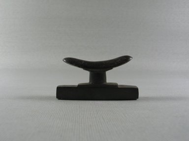  <em>Headrest Amulet</em>, ca. 1539-1075 B.C.E., or later. Hematite, 1 3/16 x 5/8 x 1 15/16 in. (3 x 1.6 x 5 cm). Brooklyn Museum, Charles Edwin Wilbour Fund, 37.1158E. Creative Commons-BY (Photo: , CUR.37.1158E_view01.jpg)