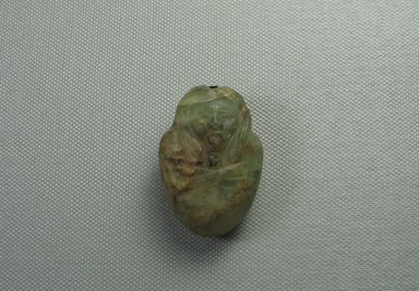  <em>Heart Amulet with Eyelet</em>, 305 B.C.E.-395 C.E. Quartz, bronze, 1 15/16 x 1 5/16 x 7/8 in. (4.9 x 3.3 x 2.3 cm). Brooklyn Museum, Charles Edwin Wilbour Fund, 37.1162E. Creative Commons-BY (Photo: Brooklyn Museum, CUR.37.1162E_view1.jpg)