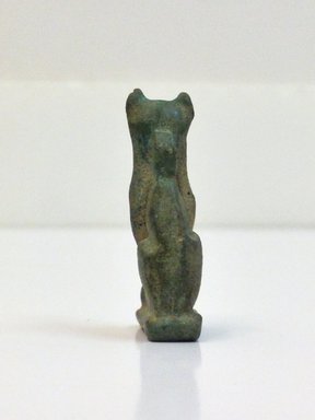 <em>Amulet Representing a Cat and Kitten</em>, 664-332 B.C.E. Faience, 1 3/8 x 1/16 x 13/16 in. (3.5 x 0.1 x 2 cm). Brooklyn Museum, Charles Edwin Wilbour Fund, 37.1188E. Creative Commons-BY (Photo: Brooklyn Museum, CUR.37.1188E_view4.jpg)