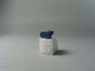  <em>Monkey Seal Inscribed for King Apries</em>, 664–332 B.C.E. Lapis lazuli, 11/16 x 1/4 x 1/2 in. (1.8 x 0.6 x 1.2 cm). Brooklyn Museum, Charles Edwin Wilbour Fund, 37.1203E. Creative Commons-BY (Photo: Brooklyn Museum, CUR.37.1203E_view4.jpg)