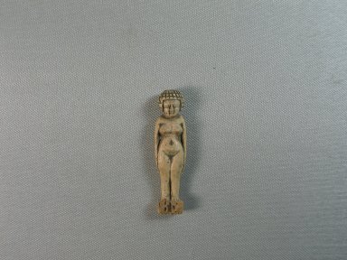  <em>Figure of a Nude Woman</em>, ca. 2008-1721 B.C.E. Ivory, 2 15/16 x 3/4 x 1/2 in. (7.4 x 1.9 x 1.2 cm). Brooklyn Museum, Charles Edwin Wilbour Fund, 37.1206E. Creative Commons-BY (Photo: Brooklyn Museum, CUR.37.1206E_view1.jpg)