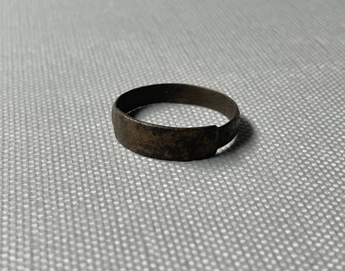  <em>Finger Ring</em>. Silver, copper, Diam. 7/8 in. (2.2 cm). Brooklyn Museum, Charles Edwin Wilbour Fund, 37.1215E. Creative Commons-BY (Photo: Brooklyn Museum, CUR.37.1215E_overall.JPG)