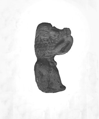  <em>Inlay in Form of Striding Baboon</em>, 525-30 B.C.E. Faience, 1 5/8 x 7/8 x 3/16 in. (4.2 x 2.3 x 0.5 cm). Brooklyn Museum, Charles Edwin Wilbour Fund, 37.1282E. Creative Commons-BY (Photo: Brooklyn Museum, CUR.37.1282E_37.1123E_GRPA_cropped.jpg)