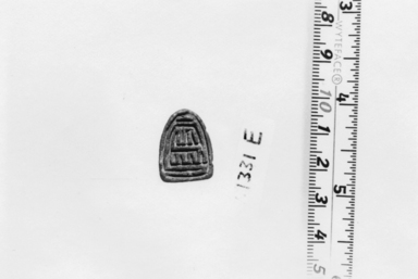  <em>Seal with Frog in Relief</em>. Faience, 1/4 in. (0.7 cm). Brooklyn Museum, Charles Edwin Wilbour Fund, 37.1331E. Creative Commons-BY (Photo: , CUR.37.1331E_NegA_print_bw.jpg)