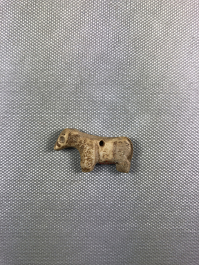  <em>Amulet of a Quadruped</em>. Stone? Bone?, 13/16 × 1/4 × 1 7/16 in. (2.1 × 0.6 × 3.7 cm). Brooklyn Museum, Charles Edwin Wilbour Fund, 37.1342E. Creative Commons-BY (Photo: , CUR.37.1342E_view01.jpg)