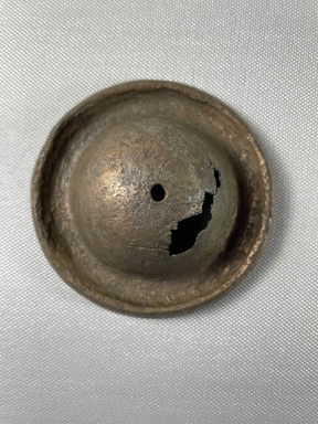  <em>Circular Object</em>, 664–332 B.C.E. Bronze, 1 9/16 x 3 5/8 in. (4 x 9.2 cm). Brooklyn Museum, Charles Edwin Wilbour Fund, 37.1428E. Creative Commons-BY (Photo: Brooklyn Museum, CUR.37.1428E_view01.jpg)