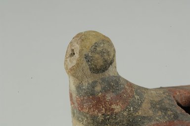 Coptic. <em>Bird</em>, 313-642 C.E. Terracotta, pigment, 4 1/2 x 2 3/8 x 7/8 in. (11.5 x 6 x 2.2 cm). Brooklyn Museum, Charles Edwin Wilbour Fund, 37.1560E. Creative Commons-BY (Photo: Brooklyn Museum (in collaboration with Index of Christian Art, Princeton University), CUR.37.1560E_detail01_ICA.jpg)