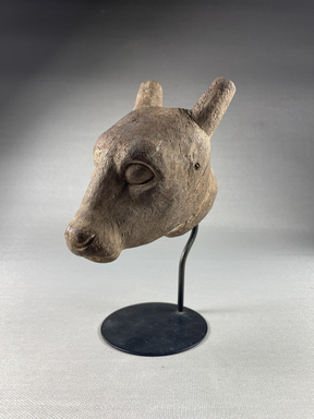  <em>Small Bull's Head</em>, 664-332 B.C.E. Wood, plaster, pigment, 6 3/4 × 2 15/16 × 4 15/16 in. (17.2 × 7.5 × 12.6 cm). Brooklyn Museum, Charles Edwin Wilbour Fund, 37.1562E. Creative Commons-BY (Photo: Brooklyn Museum, CUR.37.1562E_view01.jpg)