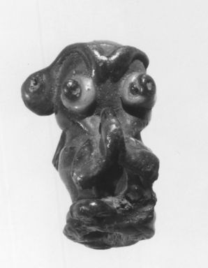 Phoenician. <em>Pendant in Form of Monkey</em>, 5th century B.C.E. Glass, 13/16 x 9/16 x 5/8 in. (2.1 x 1.5 x 1.6 cm). Brooklyn Museum, Charles Edwin Wilbour Fund, 37.1656E. Creative Commons-BY (Photo: Brooklyn Museum, CUR.37.1656E_negA_bw.jpg)