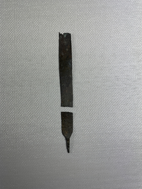  <em>Broken Slender Knife</em>, ca. 1938-1190 B.C.E. Bronze, 37.1670Ea: 1 7/16 × 3/8 × 1/16 in. (3.7 × 1 × 0.2 cm). Brooklyn Museum, Charles Edwin Wilbour Fund, 37.1670Ea-b. Creative Commons-BY (Photo: Brooklyn Museum, CUR.37.1670Eb_37.1670Ea_view01.jpg)