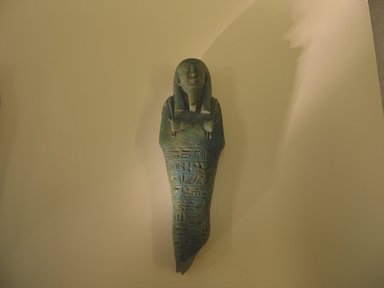  <em>Ushabti of Nefer-ib-re</em>, 664–525 B.C.E. Faience, 6 1/16 x 1 7/8 x 1 5/16 in. (15.4 x 4.7 x 3.4 cm). Brooklyn Museum, Charles Edwin Wilbour Fund, 37.167E. Creative Commons-BY (Photo: Brooklyn Museum, CUR.37.167E_view1.jpg)