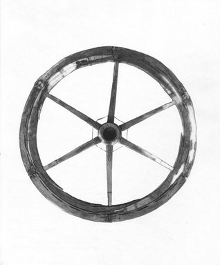 <em>Large Chariot Wheel</em>, ca. 185 B.C.E. Wood (cypress), Diam. 14 15/16 in. (38 cm). Brooklyn Museum, Charles Edwin Wilbour Fund, 37.1700E. Creative Commons-BY (Photo: Brooklyn Museum, CUR.37.1700E_NegA_print_bw.jpg)