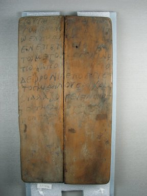  <em>Writing Exercise Board</em>, 305 B.C.E.-395 C.E. Wood, pigment, 11 5/16 x 6 1/4 x 3/8 in. (28.8 x 15.8 x 1 cm). Brooklyn Museum, Charles Edwin Wilbour Fund, 37.1725E. Creative Commons-BY (Photo: Brooklyn Museum, CUR.37.1725E_view1.jpg)