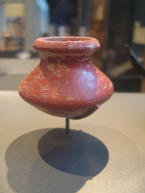  <em>Pot with Beveled Rim</em>, ca. 1630-1539 B.C.E. Clay, slip, 2 3/16 x 2 15/16 in. (5.5 x 7.5 cm). Brooklyn Museum, Charles Edwin Wilbour Fund, 37.1728E. Creative Commons-BY (Photo: Brooklyn Museum, CUR.37.1728E_erg2.jpg)