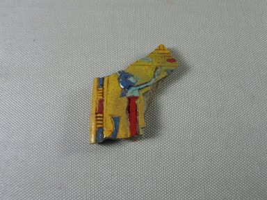  <em>Fragment of a Pectoral</em>, ca. 1539-1075 B.C.E. Faience, 2 3/16 × 1 7/8 × 3/8 in. (5.6 × 4.8 × 1 cm). Brooklyn Museum, Charles Edwin Wilbour Fund, 37.1739E. Creative Commons-BY (Photo: , CUR.37.1739E_view01.jpg)