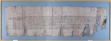  <em>Papyrus Inscribed in Demotic</em>, ca. 205 B.C.E. Papyrus, ink, Glass: 12 11/16 x 34 1/8 in. (32.3 x 86.7 cm). Brooklyn Museum, Charles Edwin Wilbour Fund, 37.1781E (Photo: Brooklyn Museum, CUR.37.1781E_IMLS_PS5.jpg)