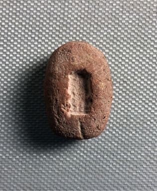  <em>Mold for Making Amulet</em>, ca.1539-525 B.C.E. Clay, 1 1/16 × 3/4 × 3/8 in. (2.7 × 1.9 × 1 cm). Brooklyn Museum, Charles Edwin Wilbour Fund, 37.1891E. Creative Commons-BY (Photo: , CUR.37.1891E_view01.jpg)