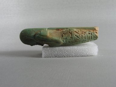  <em>Ushabti of the Head of Physician Psamtik-seneb</em>, 664-525 B.C.E. Faience, 3 15/16 x 1 3/8 in. (10 x 3.5 cm). Brooklyn Museum, Charles Edwin Wilbour Fund, 37.211E. Creative Commons-BY (Photo: Brooklyn Museum, CUR.37.211E_view5.jpg)
