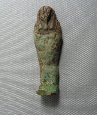  <em>Ushabti of Yuf-o</em>, 664-343 B.C.E. Faience, 3 9/16 x 7/8 x 1/2 in. (9 x 2.3 x 1.3 cm). Brooklyn Museum, Charles Edwin Wilbour Fund, 37.232E. Creative Commons-BY (Photo: Brooklyn Museum, CUR.37.232E_view3.jpg)