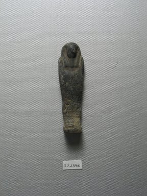  <em>Ushabti of Yuf-o</em>, 664-343 B.C.E. Faience, 3 9/16 x 1 x 13/16 in. (9 x 2.5 x 2 cm). Brooklyn Museum, Charles Edwin Wilbour Fund, 37.239E. Creative Commons-BY (Photo: Brooklyn Museum, CUR.37.239E_view6.jpg)