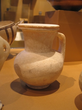  <em>Egyptian Jug and Lid Based on Cypriot Bilbil</em>, ca. 1514-1400 B.C.E. Egyptian alabaster (calcite), 6 1/16 x Diam. 4 7/8 in. (15.4 x 12.4 cm). Brooklyn Museum, Charles Edwin Wilbour Fund, 37.252Ea-b. Creative Commons-BY (Photo: Brooklyn Museum, CUR.37.252Ea-b_erg2.jpg)