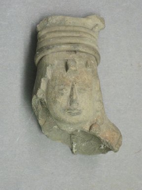 Maya. <em>Head of Female Figurine</em>. Brownish clay Brooklyn Museum, Frank Sherman Benson Fund and the Henry L. Batterman Fund, 37.2771PA. Creative Commons-BY (Photo: Brooklyn Museum, CUR.37.2771PA.jpg)