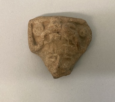  <em>Head from Molded Figurine</em>. Reddish clay, 1 1/2 × 1 1/2 × 1/2 in. (3.8 × 3.8 × 1.3 cm). Brooklyn Museum, Frank Sherman Benson Fund and the Henry L. Batterman Fund, 37.2858PA. Creative Commons-BY (Photo: Brooklyn Museum, CUR.37.2858PA.jpg)