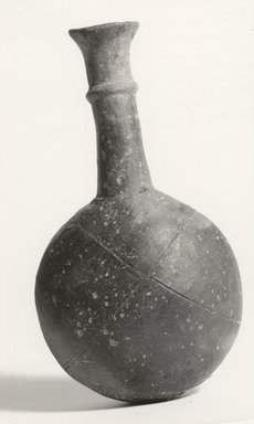 Cypriot. <em>Small Flask</em>, ca. 1539-1075 B.C.E. or ca. 1600-1050 B.C.E. Clay, slip, 5 3/16 × 2 15/16 × 1 13/16 in. (13.2 × 7.5 × 4.6 cm). Brooklyn Museum, Charles Edwin Wilbour Fund, 37.327E. Creative Commons-BY (Photo: Brooklyn Museum, CUR.37.327E_print_NegD_bw.jpg)