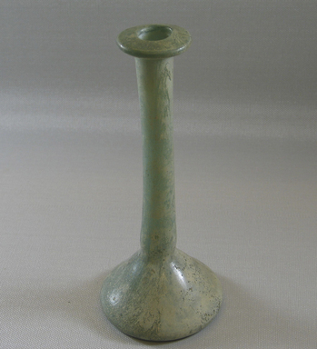  <em>Bottle</em>, 100-395 C.E. Glass, Greatest diam. 2 15/16 x 7 1/8 in. (7.5 x 18.1 cm). Brooklyn Museum, Charles Edwin Wilbour Fund, 37.354E. Creative Commons-BY (Photo: Brooklyn Museum, CUR.37.354E_view1.jpg)