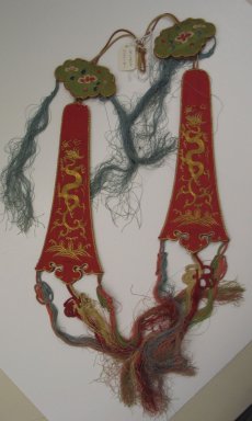  <em>Pair of Pendant Accessories</em>, late 19th-early 20th century. Silk, satin, each: 21 1/2 in. (54.6 cm). Brooklyn Museum, Frank L. Babbott Fund, 37.371.80.1-.2. Creative Commons-BY (Photo: Brooklyn Museum, CUR.37.371.80.1-.2.jpg)