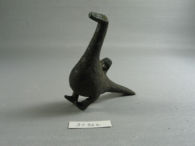 Greek. <em>Geometric Bird</em>, second half 8th century or 7th century B.C.E. Bronze, 3 1/16 x 1 1/8 x 2 13/16 in. (7.7 x 2.9 x 7.2 cm). Brooklyn Museum, Museum Collection Fund, 37.382. Creative Commons-BY (Photo: Brooklyn Museum, CUR.37.382_view01.jpg)