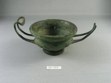 Greek. <em>Kylix</em>, 3rd century B.C.E. Bronze, 2 7/16 × 4 1/8 × 6 15/16 in. (6.2 × 10.4 × 17.6 cm). Brooklyn Museum, Museum Collection Fund, 37.388. Creative Commons-BY (Photo: Brooklyn Museum, CUR.37.388_view01.jpg)