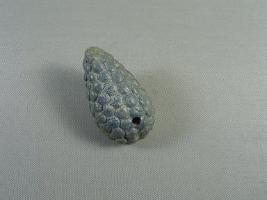  <em>Grape Shaped Ornament</em>, ca. 1352-1332 B.C.E. Faience, 1 3/4 × 3 1/8 in. (4.4 × 8 cm). Brooklyn Museum, Gift of the Egypt Exploration Society, 37.408. Creative Commons-BY (Photo: , CUR.37.408_view01.jpg)
