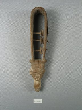  <em>Upper Part of a Sistrum</em>, ca. 1539-1190 B.C.E., or later. Wood, 8 x 1 1/2 x 2 1/8 in. (20.3 x 3.8 x 5.4 cm). Brooklyn Museum, Charles Edwin Wilbour Fund, 37.438E. Creative Commons-BY (Photo: Brooklyn Museum, CUR.37.438E_view1.jpg)