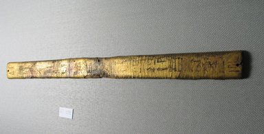  <em>Strip of Wood Covered with Gold Leaf Probably from a Piece of Furniture</em>, ca. 1539–1075 B.C.E. Wood, stucco, gold leaf, 13 1/16 x 15/16 x 1/8 in. (33.2 x 2.4 x 0.3 cm). Brooklyn Museum, Charles Edwin Wilbour Fund, 37.439E. Creative Commons-BY (Photo: Brooklyn Museum, CUR.37.439E_view2.jpg)