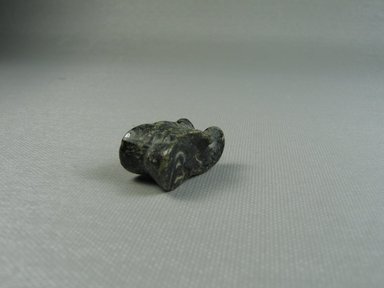  <em>Astragalus</em>. Steatite, 11/16 x 9/16 x 1 3/16 in. (1.8 x 1.5 x 3 cm). Brooklyn Museum, Charles Edwin Wilbour Fund, 37.454E. Creative Commons-BY (Photo: Brooklyn Museum, CUR.37.454E_view02.jpg)