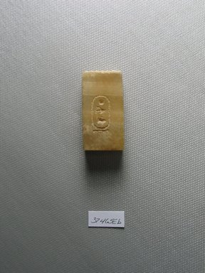  <em>Two Tablets Bearing a Cartouche Probably from a Foundation Deposit</em>, 664-525 B.C.E. Egyptian alabaster (calcite), 37.465Ea: 1 15/16 x 1 x 3/8 in. (4.9 x 2.5 x 1 cm). Brooklyn Museum, Charles Edwin Wilbour Fund, 37.465Ea-b. Creative Commons-BY (Photo: Brooklyn Museum, CUR.37.465Eb_view1.jpg)