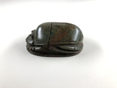  <em>Heart Scarab</em>, ca. 1539–1075 B.C.E. Stone (basalt?), 13/16 x 1 1/2 x 2 1/8 in. (2 x 3.8 x 5.4 cm). Brooklyn Museum, Charles Edwin Wilbour Fund, 37.488E. Creative Commons-BY (Photo: , CUR.37.488E_view04.jpg)
