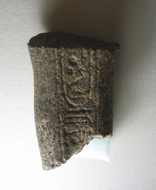  <em>Fragmentary Shabti of Akhenaten</em>, ca. 1352-1336 B.C.E. Granite, 4 3/16 x 2 11/16 x 1 3/4 in. (10.6 x 6.9 x 4.5 cm). Brooklyn Museum, Charles Edwin Wilbour Fund, 37.507. Creative Commons-BY (Photo: Brooklyn Museum, CUR.37.507_view1.jpg)