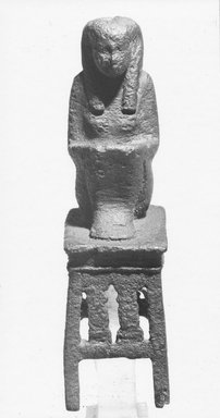  <em>Small Figure of the Goddess Maat Seated on s Stool</em>, 664–525 B.C.E. Bronze, 3 1/16 x 7/8 x 1 1/4 in. (7.8 x 2.2 x 3.2 cm). Brooklyn Museum, Charles Edwin Wilbour Fund, 37.542E. Creative Commons-BY (Photo: Brooklyn Museum, CUR.37.542E_NegL814_20_print_bw.jpg)