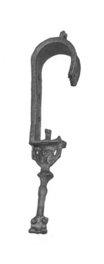  <em>Sistrum</em>, 305-30 B.C.E. Bronze, 5 3/4 x 1 x 1 3/8 in. (14.6 x 2.6 x 3.5 cm). Brooklyn Museum, Charles Edwin Wilbour Fund, 37.573E. Creative Commons-BY (Photo: Brooklyn Museum, CUR.37.573E_NegID_37.573E_GRPA_print_cropped_bw.jpg)