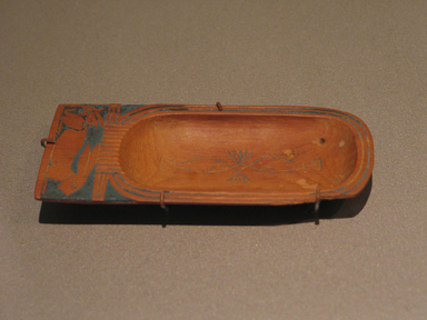  <em>Cosmetic Dish in Form of Cartouche Containing Fish</em>, ca. 1539-1292 B.C.E. Wood, frit, 2 1/8 x 4 5/8 in. (5.4 x 11.8 cm). Brooklyn Museum, Charles Edwin Wilbour Fund, 37.608E. Creative Commons-BY (Photo: Brooklyn Museum, CUR.37.608E_erg456.jpg)