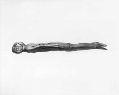 Egyptian. <em>Furniture Attachment (?) in Form of Bound Prisoner</em>, ca. 1539–1292 B.C.E. Wood, 6 3/4 x 1 1/2 x 3/4 in. (17.1 x 3.8 x 1.9 cm). Brooklyn Museum, Charles Edwin Wilbour Fund, 37.612E. Creative Commons-BY (Photo: Brooklyn Museum, CUR.37.612E_NegH1_print_bw.jpg)