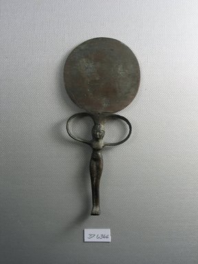  <em>Small Mirror with Handle in Form of Nude Girl</em>, ca. 1292-1190 B.C.E. or later. Bronze, 6 1/4 x 2 11/16 x 1/2 in. (15.9 x 6.9 x 1.2 cm). Brooklyn Museum, Charles Edwin Wilbour Fund, 37.636E. Creative Commons-BY (Photo: Brooklyn Museum, CUR.37.636E_view1.jpg)