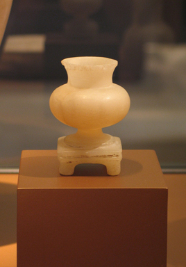  <em>Kohl Pot on Base</em>, ca. 1479-1390 B.C.E. Egyptian alabaster (calcite), 3 1/16 x 2 5/16 in. (7.8 x 5.8 cm). Brooklyn Museum, Charles Edwin Wilbour Fund, 37.640E. Creative Commons-BY (Photo: Brooklyn Museum, CUR.37.640E_erg456.jpg)