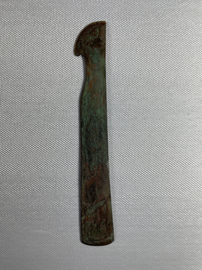  <em>Razor or Knife</em>, ca. 1539-1292 B.C.E. Bronze, 5 7/8 × 7/8 × 1/16 in. (15 × 2.2 × 0.1 cm). Brooklyn Museum, Charles Edwin Wilbour Fund, 37.657E. Creative Commons-BY (Photo: Brooklyn Museum, CUR.37.657E_view01.jpg)