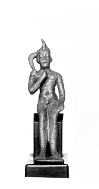  <em>Small Statuette of the Child Horus</em>, 305–30 B.C.E. Bronze, 2 3/16 x 11/16 x 1 1/8 in. (5.6 x 1.8 x 2.8 cm). Brooklyn Museum, Charles Edwin Wilbour Fund, 37.686E. Creative Commons-BY (Photo: , CUR.37.686E_NegID_37.537E_GRPA_print_cropped_bw.jpg)