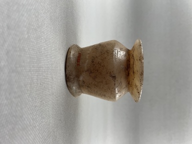  <em>Kohl Jar</em>, ca. 1539–1075 B.C.E. Egyptian alabaster (calcite), 2 5/16 × Diam. 2 3/16 in. (5.8 × 5.5 cm). Brooklyn Museum, Charles Edwin Wilbour Fund, 37.695Ea. Creative Commons-BY (Photo: Brooklyn Museum, CUR.37.695Ea_37.695Eb_overall01.JPG)