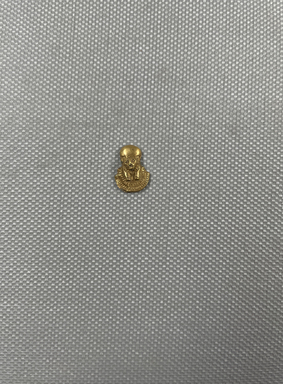  <em>Small Pendant Representing a Lioness Head of a Goddess, Probably Sekhmet or Bast</em>, 945-712 B.C.E. Gold, 9/16 x 3/8 in. (1.4 x 1 cm). Brooklyn Museum, Charles Edwin Wilbour Fund, 37.709E. Creative Commons-BY (Photo: Brooklyn Museum, CUR.37.709E_overall.JPG)